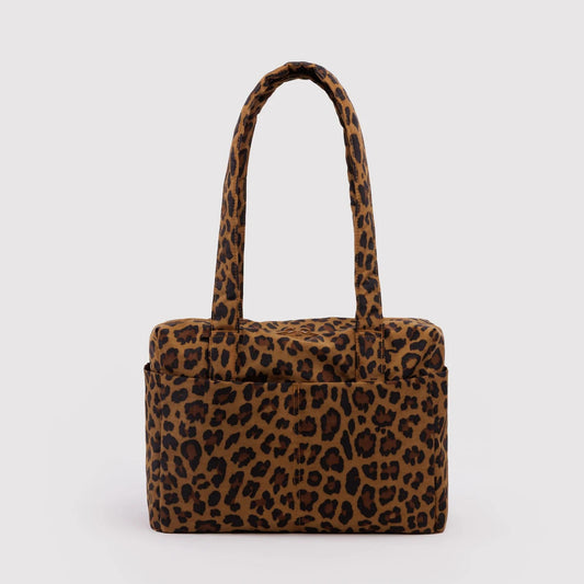 A leopard print handbag with a structured rectangular shape and two top handles, shown against a plain light gray background.