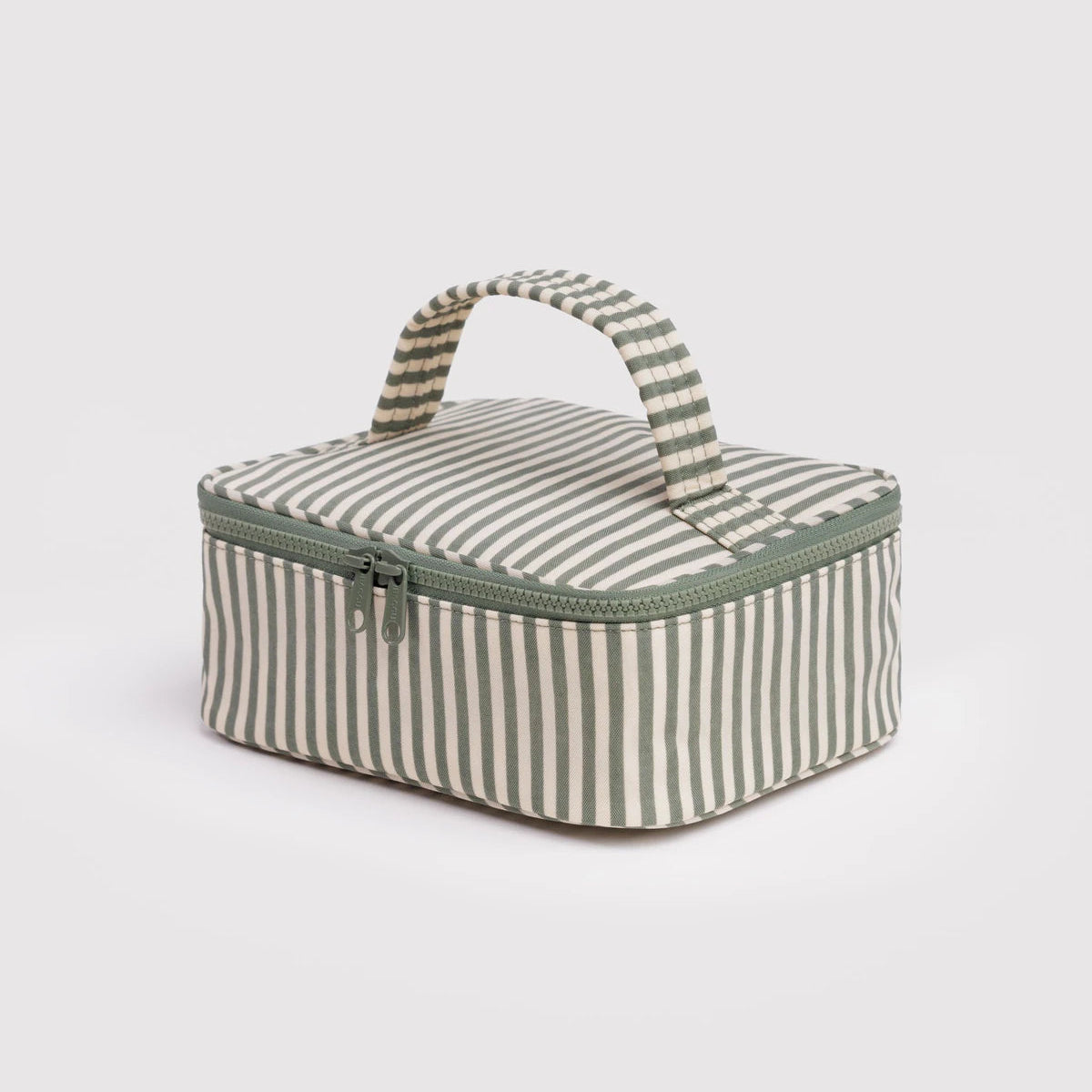 Striped fabric storage box with a handle on a light gray background