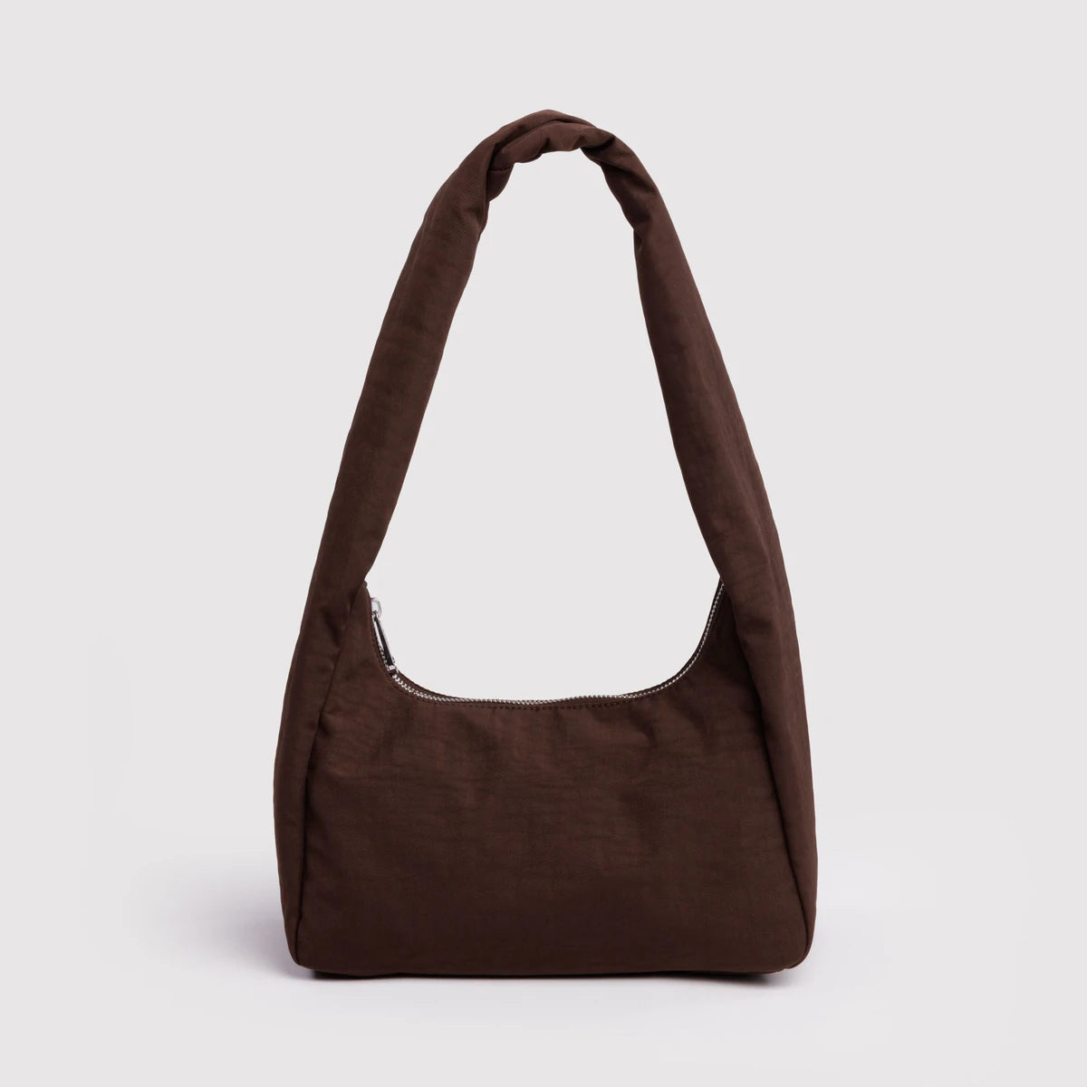 Brown shoulder bag on a light gray background