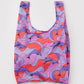 Reusable bag with dolphin pattern on a white background