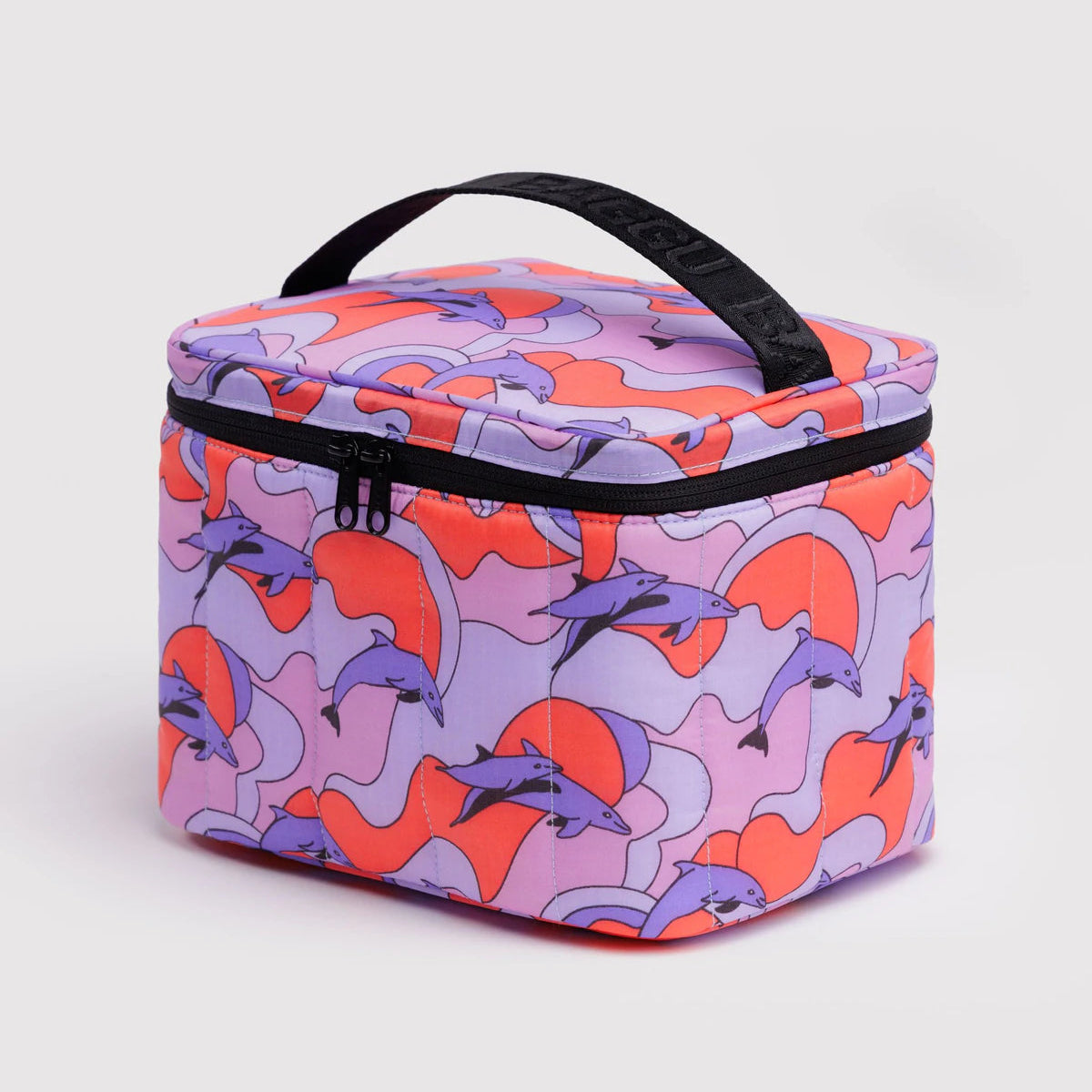 Lunch bag with dolphin pattern on a light gray background
