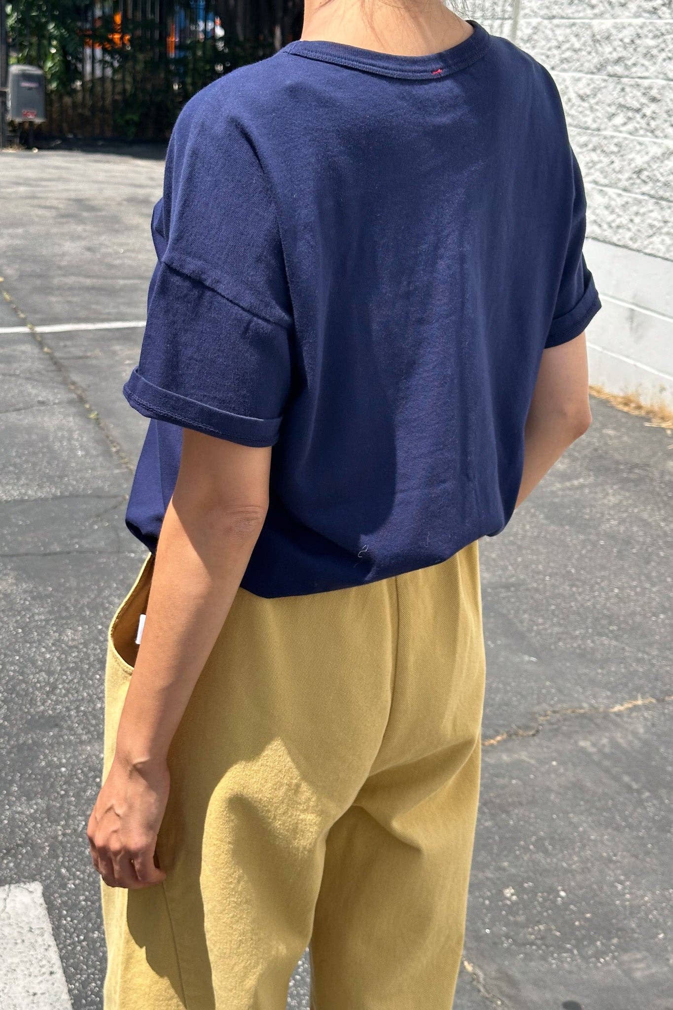 Her Tee