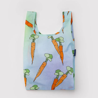 Reusable shopping bag with carrot pattern on a light blue background