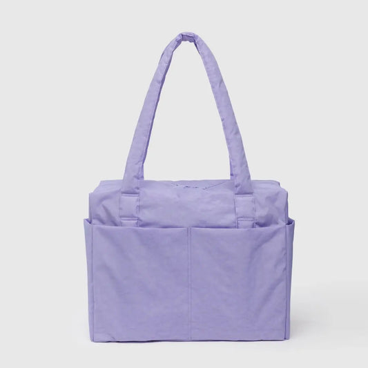 Purple tote bag with a handle on a light gray background