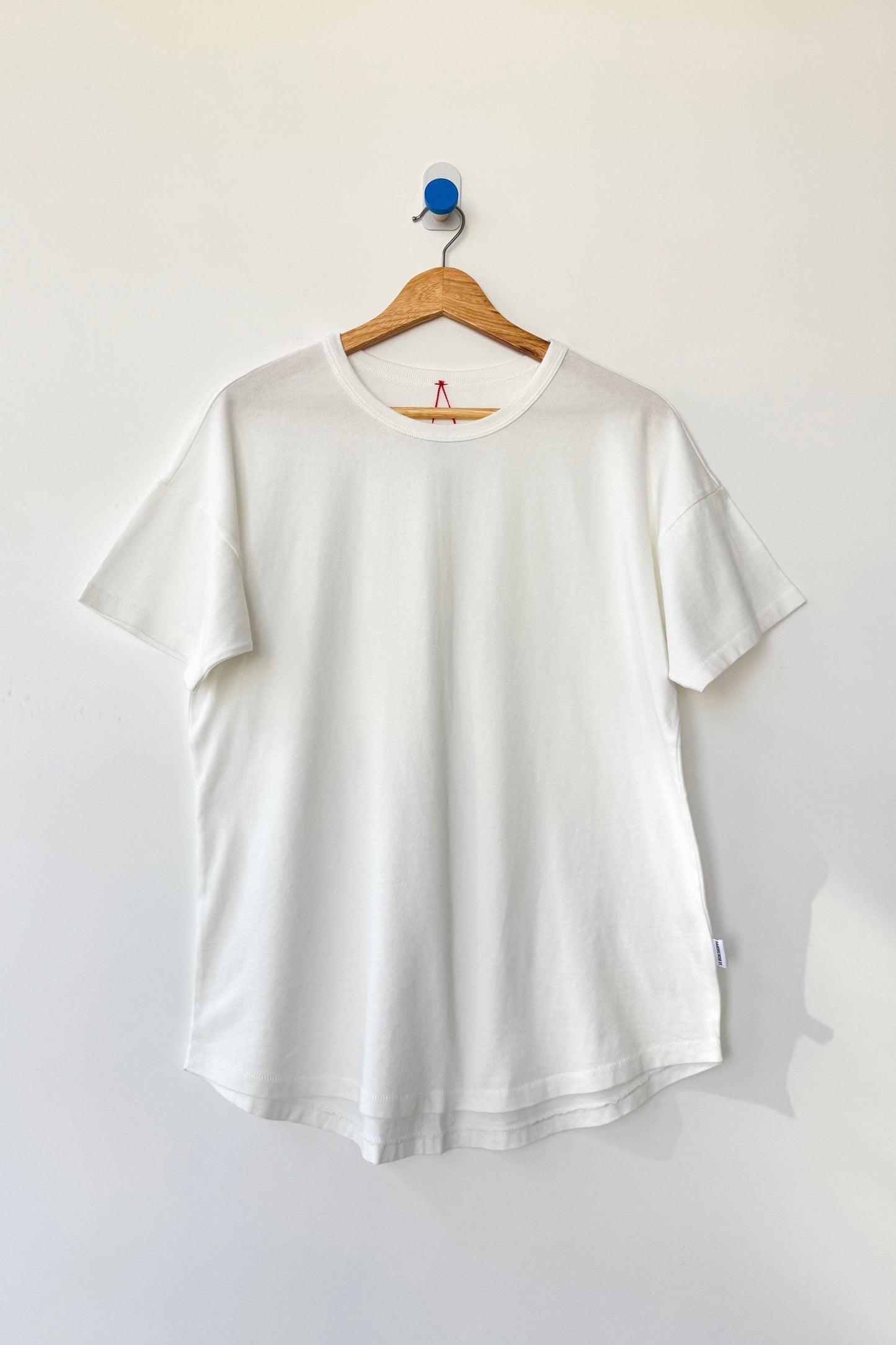 Her Tee
