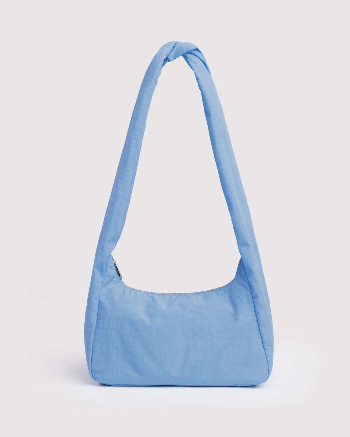 Light blue shoulder bag on a light gray background